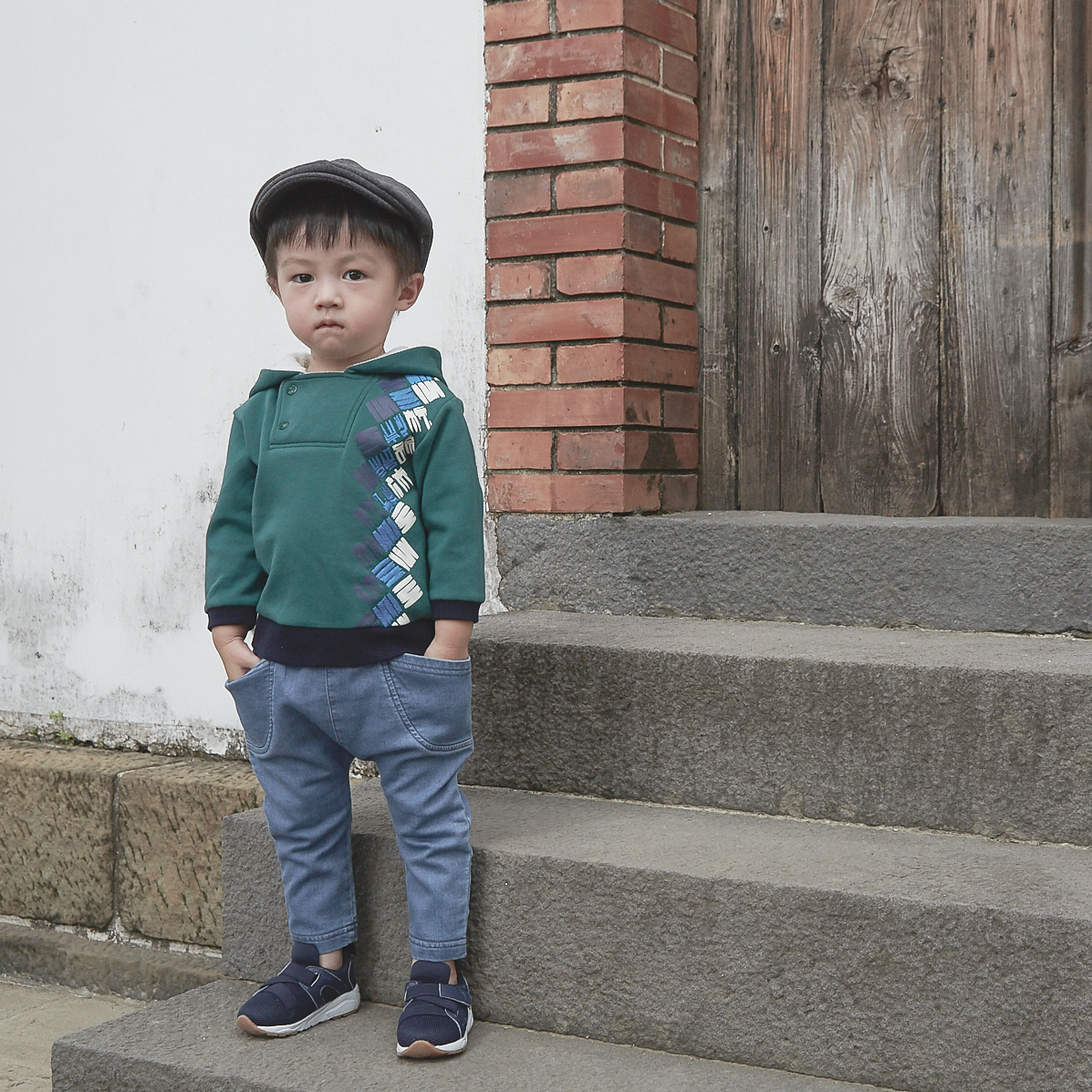 Pine green baby hoodie with good fortune print