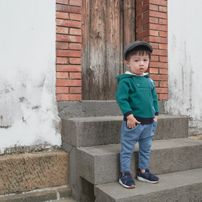 Pine green baby hoodie with good fortune print