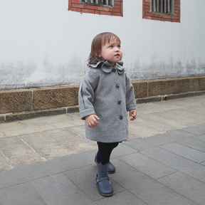 Heather grey baby coat with moonflower motif