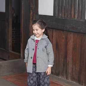 Heather grey kids coat with moonflower motif