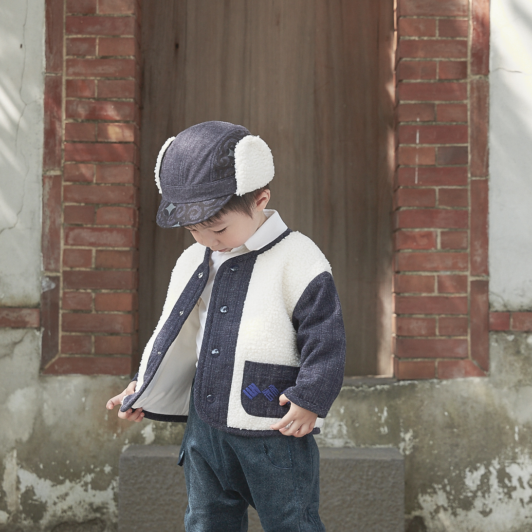 Dark blue baby aviator cap with coin motif