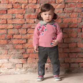 Dusty pink baby sweater with butterfly and pomegranate motif