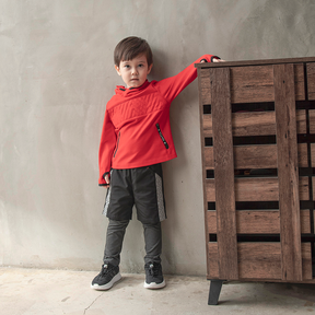 Black kids trousers with geometric designs