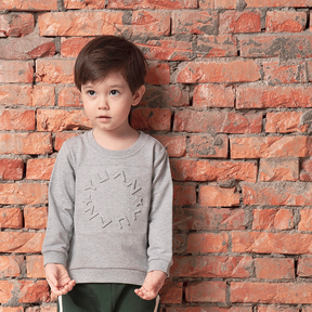 Light heather grey kids sweatshirt with embossed YUAN logo