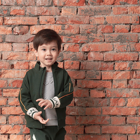 Dark green kids jacket with geometric designs