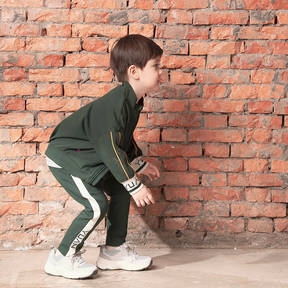 Dark green kids jacket with geometric designs