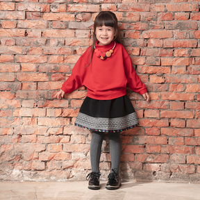 Black kids skirt with geometric designs and matching stockings