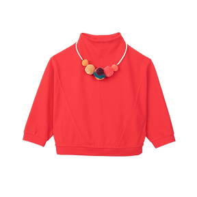 Red kids top with pom pom necklace