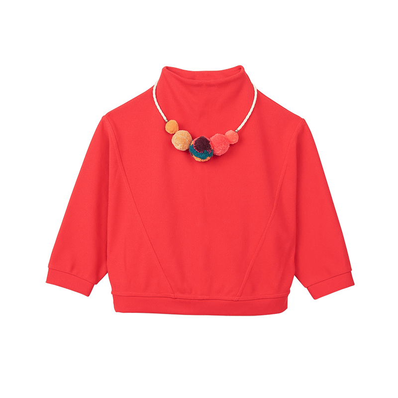 Red kids top with pom pom necklace