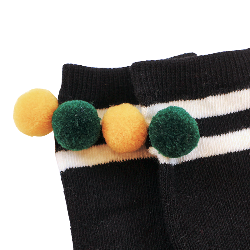 Black kids long socks with pom poms