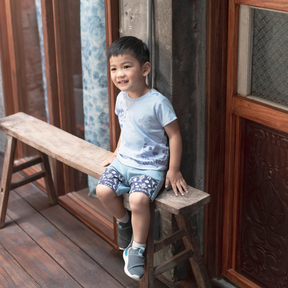 <tc>Blue baby T-shirt with dragon and tiger print</tc>