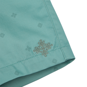 <tc>Grey green kids shorts with embroidered endless knot</tc>