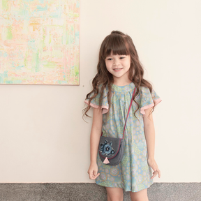 <tc>Celadon kids dress with ruffle sleeves and peacock print</tc>