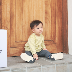 Heather grey baby trousers with dragon motif