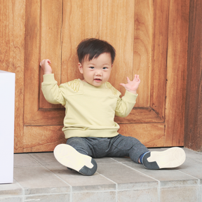 Heather grey baby trousers with dragon motif