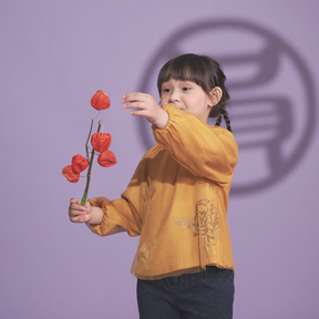 Mustard kids bubble top with gauze overlay and peony motif