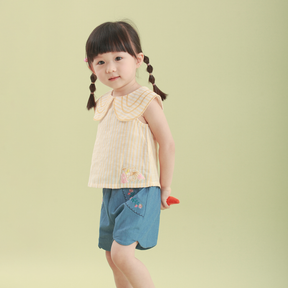 <tc>Blue baby shorts with embroidered flowers</tc>