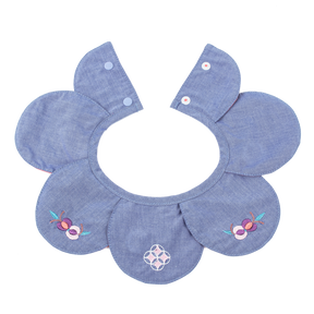 Blue petal shaped baby bib with embroidered pomegranates